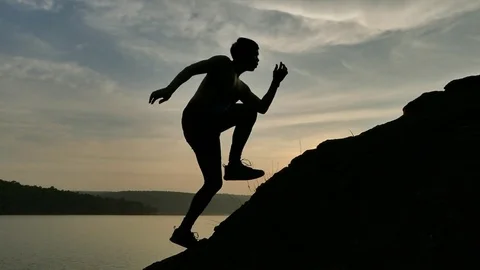 Man Runner On Top Of The World Cheering In Winning Gesture Stock Footage 82971484