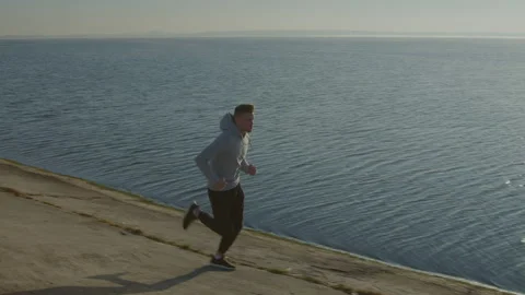 Man Runner Is Training Outdoor Video stock 165884517