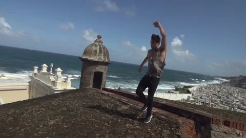 Man Running Along Ocean Front Wall Puerto Rico Stock Footage 79277229