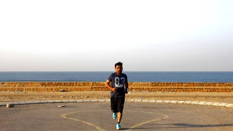 Man Running and Training for Marathon Stock Footage 96059146