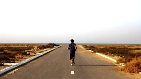 Man Running and Training for Marathon Stock Footage 96059186