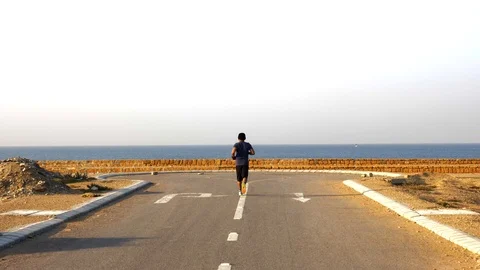 Man Running and Training for Marathon Stock Footage 96059219