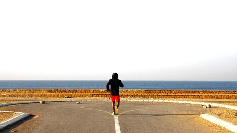 Man Running and Training for Marathon Stock Footage 96059293