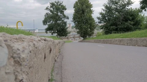 A man is running around in the park. Stock Footage 84046497