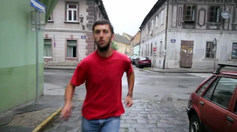 Man running away Video stock 42970635