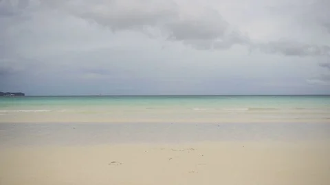 Man running on the beach Stock Footage