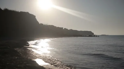 Man running on beach at sunrise. Video stock 66782534