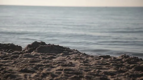 Man running on beach at sunrise. Video stock 66782955