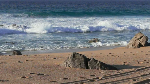 Man Running on Beach with Waves in the Background Stock Footage 45701986
