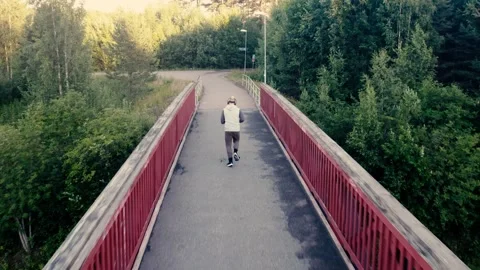 A man running on a bridge, drone shot. Stock Footage 278733045