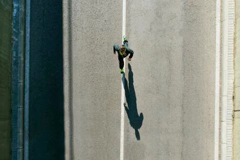 Man running in the city. Stock Photos