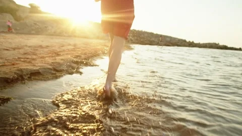 Man running on the coast of the beach Stock Footage 158612297