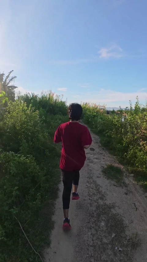 Man Running on a Dirt Path Stock Footage 333838306