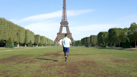 Man running Eiffel Tower Stock Footage 249202266