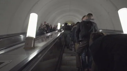 The man is running on the escalator 動画素材 69222576