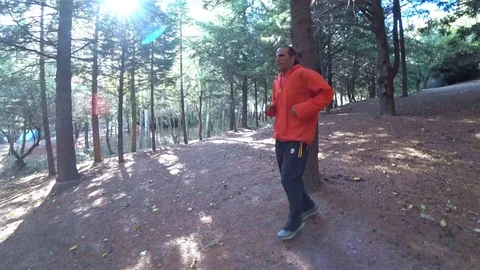 Man running at the forest Stock Footage 83773758