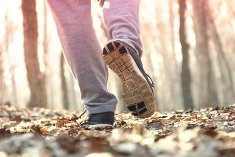 Man running in forest Stock Photos