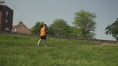 Man is running. He is dressed id T-shirt and sports shorts. 库存影片 52695212