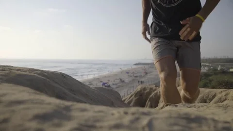 Man Running up a Hill Stock Footage 83055265