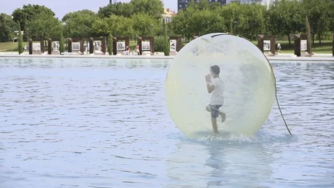Man Running inside Water Bubble Video stock 96164840