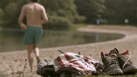 Man Running To Lake Video stock 127036103