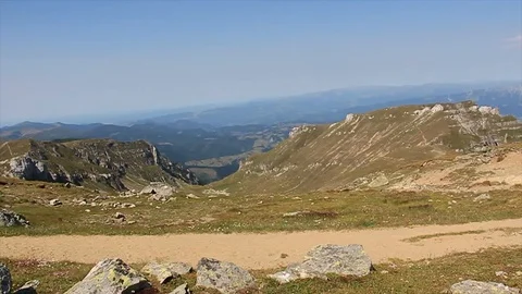 Man running on the mountain Stock Footage 90814116