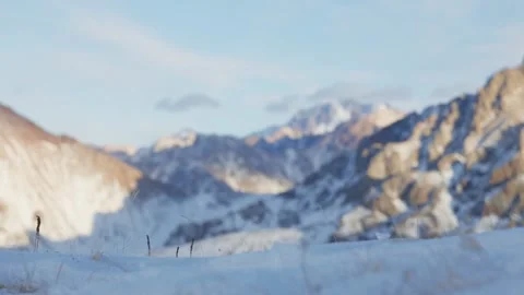 Man running at the mountain with snow Stock Footage 167213330