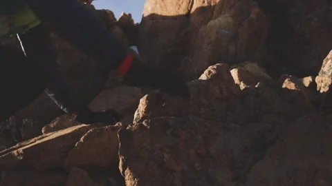 Man running at the mountain with snow Stock Footage 168349778
