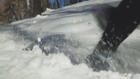 Man running at the mountain with snow Stock Footage 169926772