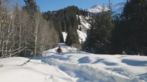 Man running at the mountain with snow Stock-Footage 169930302