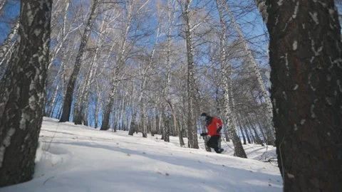 Man running at the mountain with snow Stock Footage 170428095