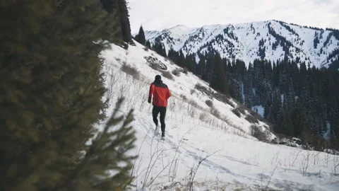 Man running at the mountain with snow Stock-Footage 170428528