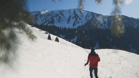 Man running at the mountain with snow Stock-Footage 170609921