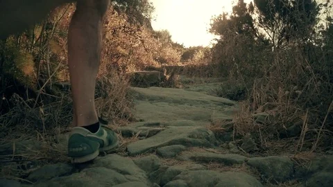 Man running on a mountain trail in Ponza Island Italy Stock Footage 80270814