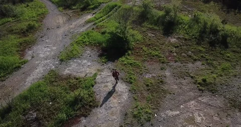 A Man Running - Orbit of Subject Stock-Footage 109136131