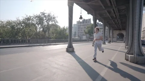 Man running in Pari, slow motion  動画素材 96412688