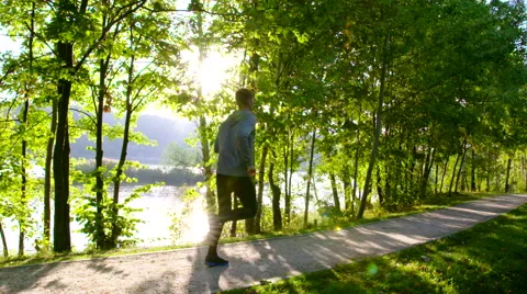 Man running at park – slow motion Stock Footage 55084768
