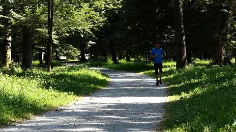 Man running at the park slow motion Stock-Footage 114172683