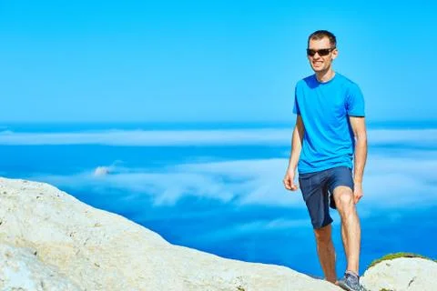 Man running on the rock Stock Photos