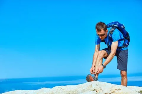 Man running on the rock Stock Photos