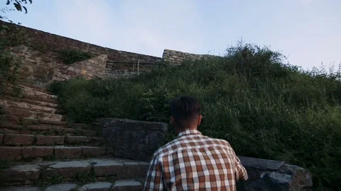 Man running up the stairs Stock Footage 71015774