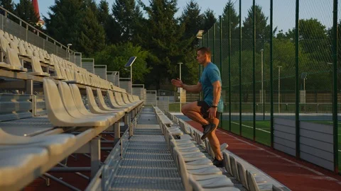 Man running up stairs Stock Footage 100032416