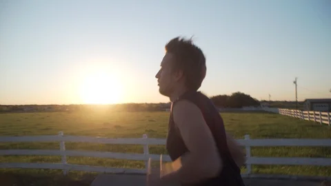 Man Running At Sunset1 Stock Footage 92415845