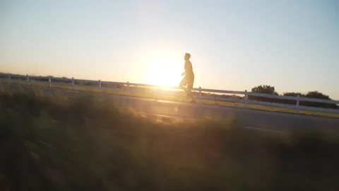 Man Running At Sunset2 Stock Footage 92415843