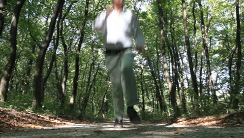 A man running through the woods (2/2) Vídeos de archivo 8690787