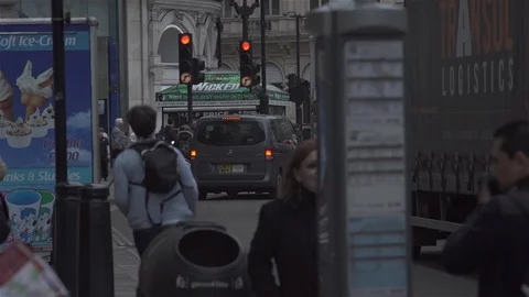 Man running towards red traffic lights. Someone take photo. Stock Footage 93207132