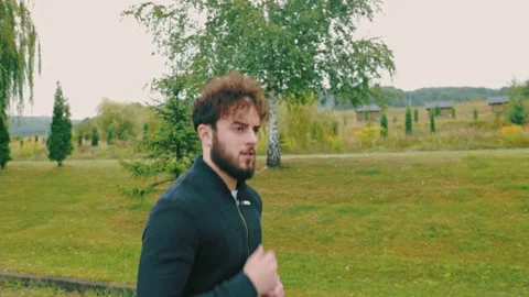 Man running on the track Stock Footage 160982958