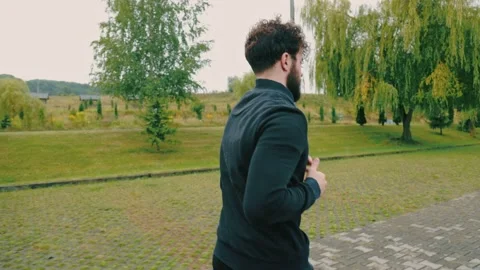 Man running on the track Stock Footage 161271180