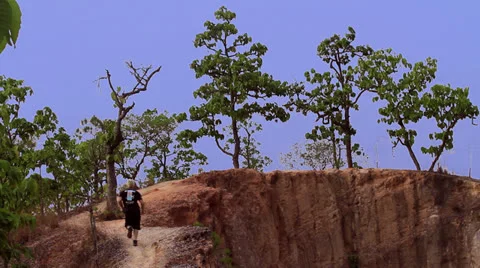 Man running trails in Pai Canyon, Thailand Stock Footage 24267840