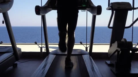 Man running on the treadmill, close up of the feet and legs Stock-Footage 197370511
